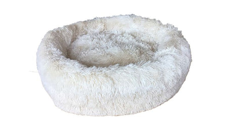 Cream doughnut-shaped calming pet bed for small to medium pets, featuring a plush center and raised rim for support and security.