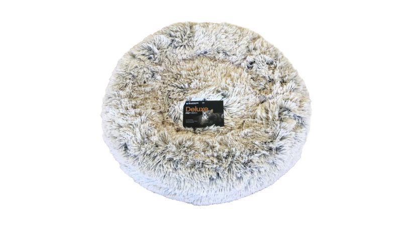 Cozy caramel latte doughnut-shaped pet bed designed for small pets, offering comfort and anxiety relief.