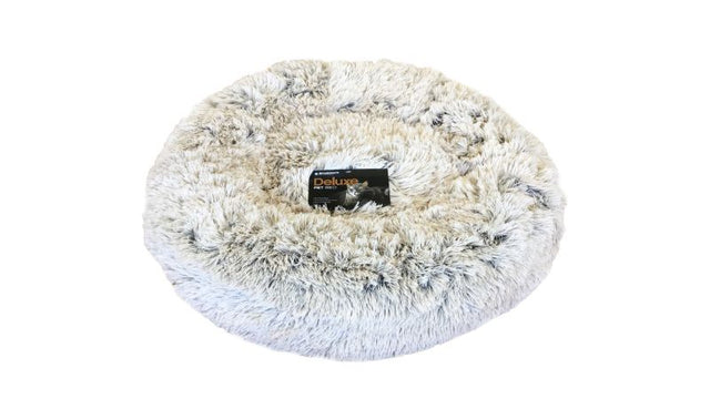 Doughnut-shaped Calming Pet Bed in Caramel Latte for large pets, offering comfort, security, and stress relief during sleep.