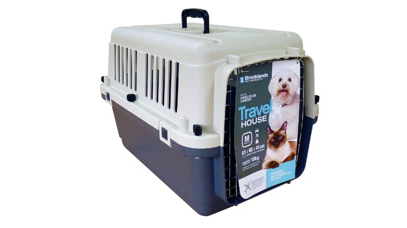 Airline Carrier for pets up to 10kg, featuring wingnut fasteners, water dish, and liquid-catching moat for safe travel.