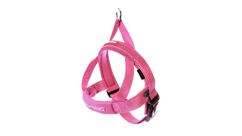 Comfortable pink dog harness with quick fit design, reflective stitching, and secure leash ring for large breeds.