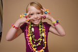 Vibrant 500 Piece Pop-Arty Jewelry Set with colorful beads, rings, bracelets, and easy snap-together design for creative fun.