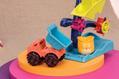 Colorful Owl About Waterfalls Toy with dump truck, teaching kids water flow mechanics through fun outdoor play experiences.