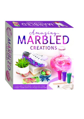 A colorful DIY kit with tools and guidance for creating stunning marbled designs on various household items.