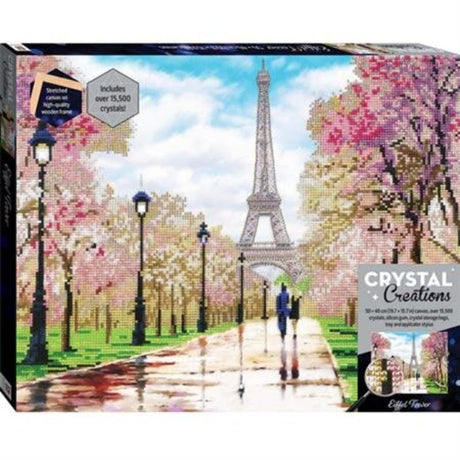 Diamond painting kit featuring the Eiffel Tower, includes a canvas with sparkling crystals and easy-to-follow instructions.