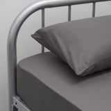 Essential Sheeting Set in charcoal, featuring a fitted sheet, flat sheet, and pillowcase, crafted for comfort and durability.