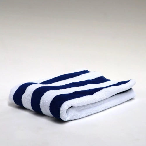 Navy and white striped pool towel, made from soft cotton terry, durable and fade-resistant, measuring 75cm x 150cm.