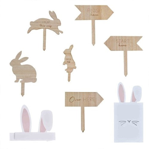 Hey Bunny Easter Egg Hunt Kit featuring bunny treat bags, headbands, and wooden signs for a fun and eco-friendly celebration.