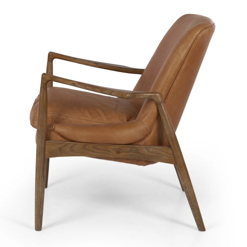 Stylish Steiner Cognac Leather Armchair with duck feather cushions and solid oak frame, perfect for modern living spaces.