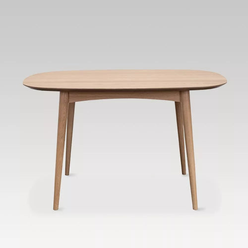 Elegant Oslo Table (1.29m x 85cm) in solid oak, perfect for dining gatherings, blending Scandinavian and retro design.