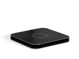 Hahnel PowerCube Wireless Charger in sleek design, charging camera batteries and phones, featuring fast 9V capabilities.