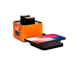 Hahnel PowerCube Wireless Charger, a compact device for charging phones and camera batteries simultaneously with fast 9V technology.