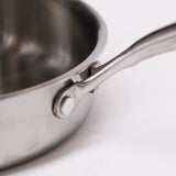 Stainless steel 28cm fry pan with riveted cool-touch handle, ideal for searing, sautéing, and easy cleaning.