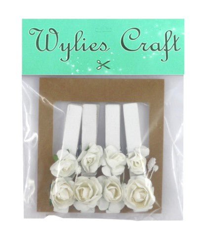 Set of 6 white flowered pegs, 7cm long, featuring 2 decorative flowers on each peg.