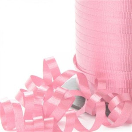Light pink curling ribbon, 450m long and 5mm wide, perfect for elegant gift-wrapping and crafting projects.