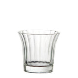 Clear glass tea light holder with a shot flared shape, perfect for creating warm, inviting ambiance in any decor.
