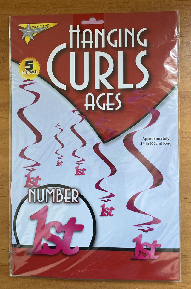 Hanging Curls Decorations in 1st Pink, 24 inches long, lightweight, perfect for parties and special occasions.