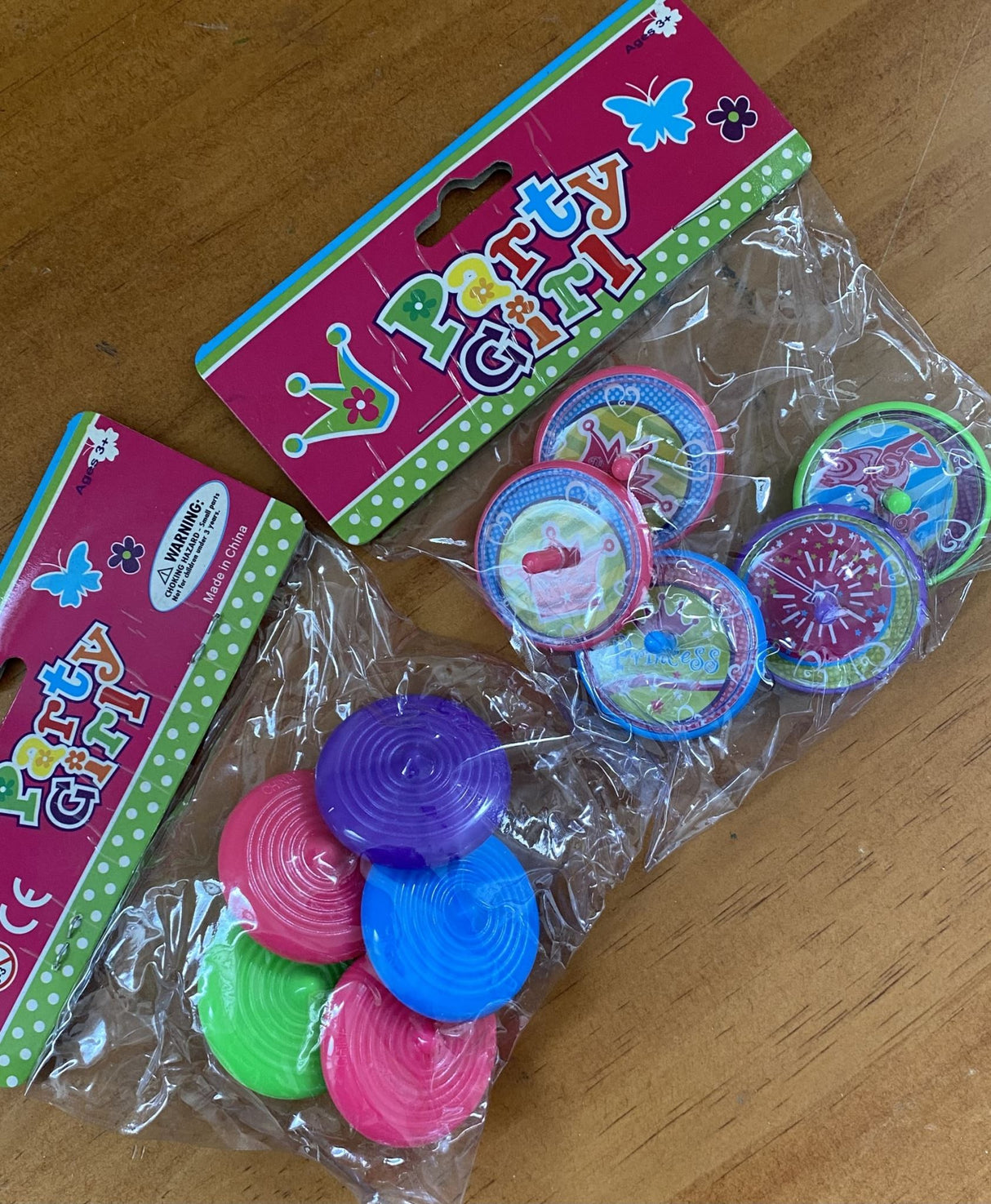Brightly colored Princess Spinning Tops in two packs, perfect for party favours and creative play for kids.