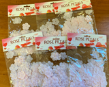 Vibrant pink biodegradable flower petals in 6 packs, perfect for weddings, parties, and eco-friendly decor.