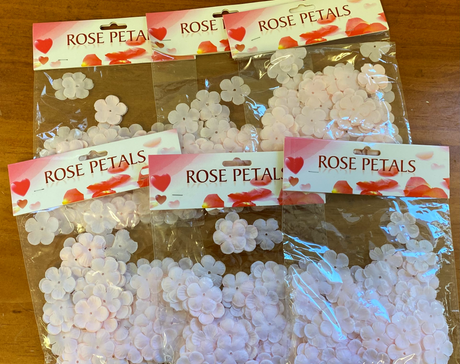 Vibrant pink biodegradable flower petals in 6 packs, perfect for weddings, parties, and eco-friendly decor.
