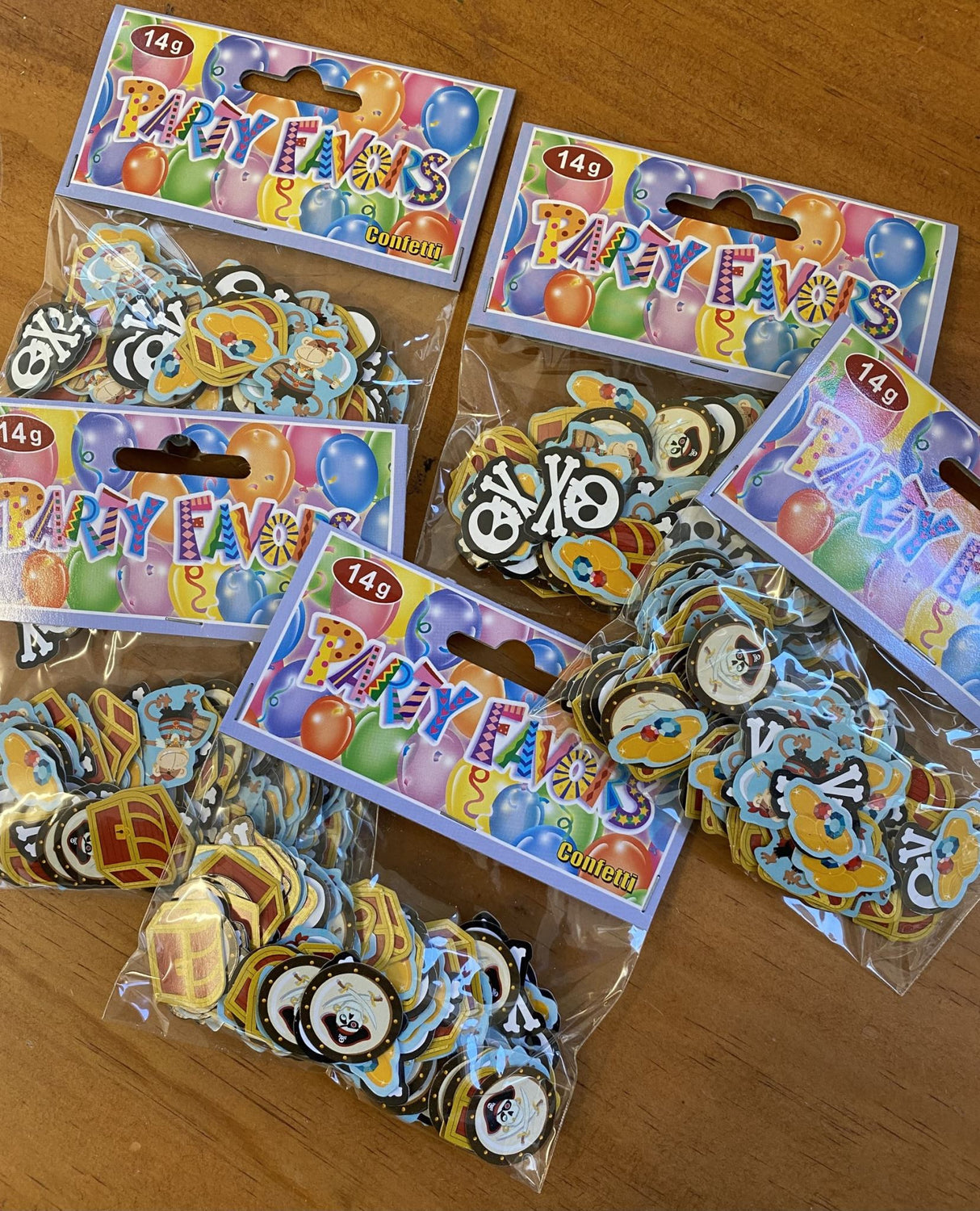 Colorful pirate-themed confetti pack with skulls and treasure chests, perfect for themed parties and celebrations.