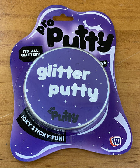 Vibrant purple Glitter Putty, perfect for stress relief and sensory play, shining with captivating glitter effects.