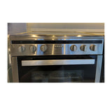 Midea 60cm Induction Freestanding Cooker with 4 burners, 70L oven, and sleek glass cooktop for efficient cooking and safety.