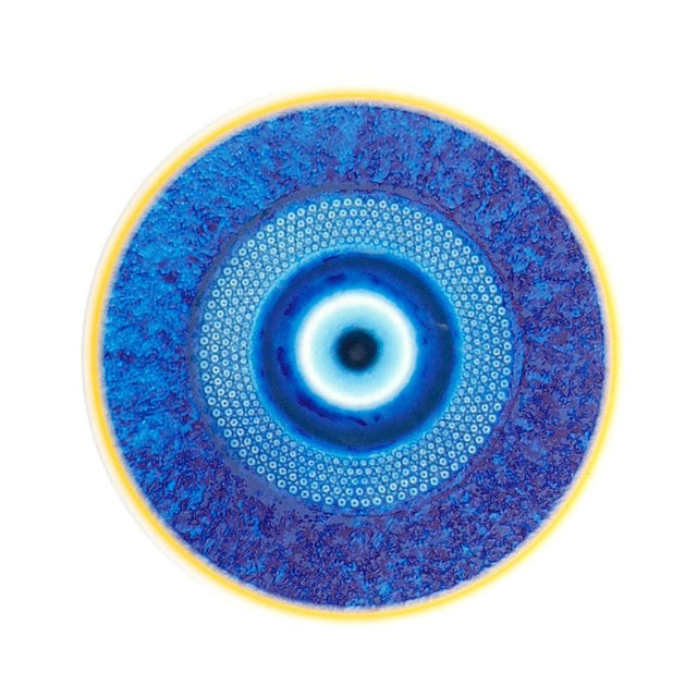 Ceramic coasters featuring an evil eye design, 11cm, combining art and functionality for home decor and protection.