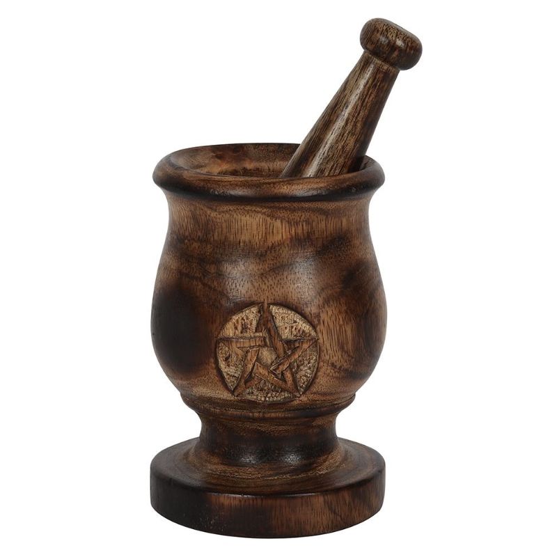 Handcrafted 5-inch mango wood mortar and pestle featuring a carved pentagram design, ideal for culinary and ritual use.