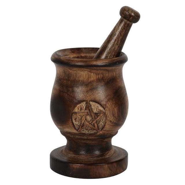 Handcrafted 5-inch mango wood mortar and pestle featuring a carved pentagram design, ideal for culinary and ritual use.