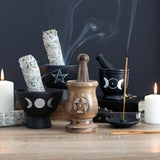Handcrafted pentagram mortar and pestle made of mango wood, perfect for grinding herbs and adding a mystical touch to rituals.
