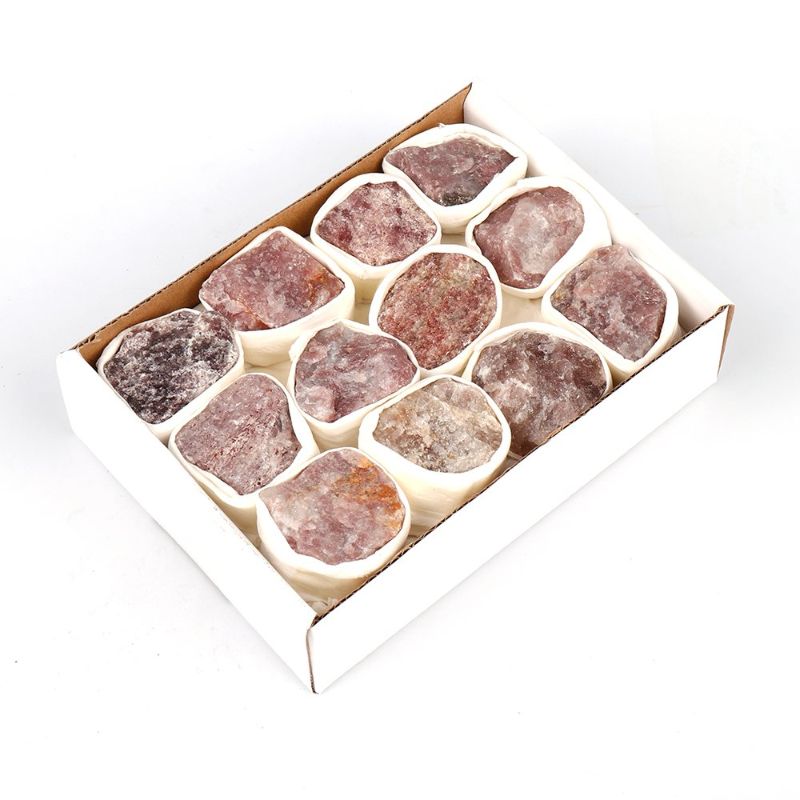 Mini crystal tray made of strawberry quartz, featuring a rose pink hue, perfect for organizing small items or decor.