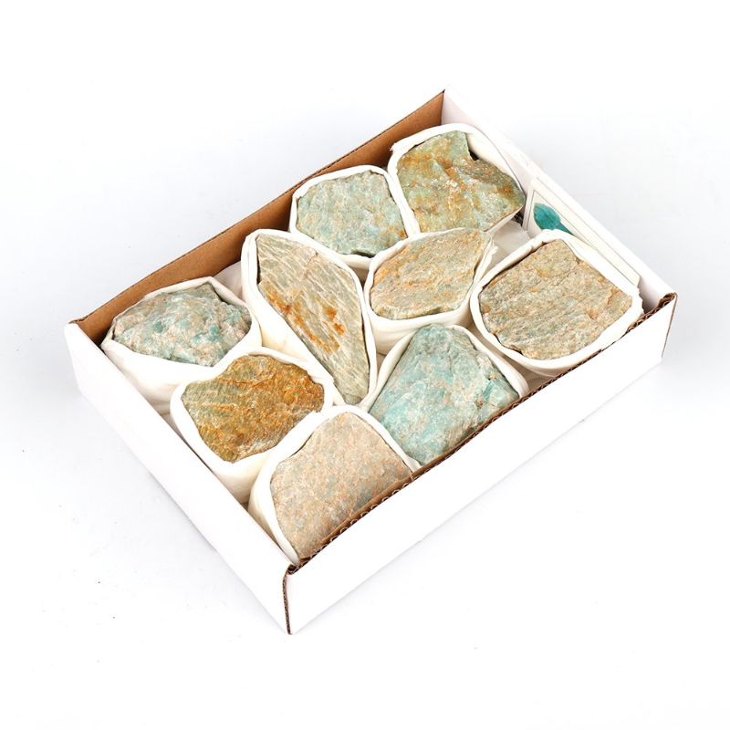 Elegant mini Amazonite crystal tray for organizing jewelry and decor, featuring calming blue-green hues and unique patterns.