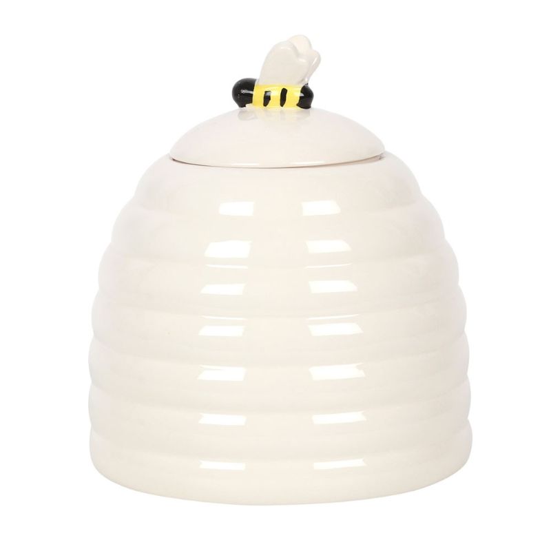 Bee Happy Ceramic Storage Jar shaped like a beehive with a 3D bee lid, perfect for storing cookies and adding cheerful decor.