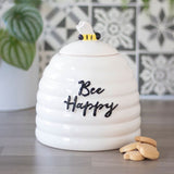 Bee Happy Ceramic Storage Jar with beehive design, uplifting message, and 3D bee lid for cheerful kitchen decor.