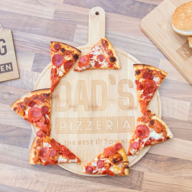 Engraved bamboo pizza board measuring 30.5x40 cm, perfect for serving homemade or store-bought pizzas with style.