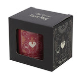 Ceramic mug in pink with The Lovers tarot design in white and gold, ideal for coffee or tea, 350ml capacity.