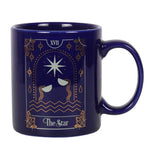 Ceramic mug featuring a gold-foil Star tarot design on a deep blue background, 350ml capacity, microwave and dishwasher safe.