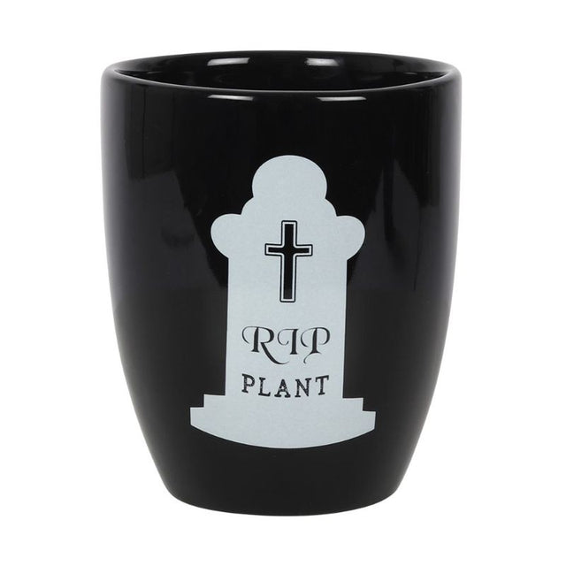 Gothic ceramic plant pot with tombstone shape and 'RIP plant' text, perfect for quirky home decor and plant lovers.