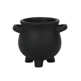Small resin plant pot shaped like a witch's cauldron, featuring 'Herbs for spells' text and star accents, perfect for herbs.