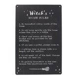 Whimsical metal sign featuring seven humorous witch rules, ideal for enchanting home decor or as a unique gift.