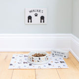 Ceramic dog food bowl with charming dog illustrations, measuring 5.7 cm high, perfect for stylish pet dining.