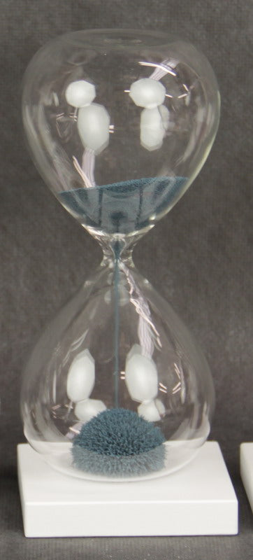 Magnetic Sand Timer in blue, 16cm tall, creating captivating sand formations with iron ore and a wooden base.