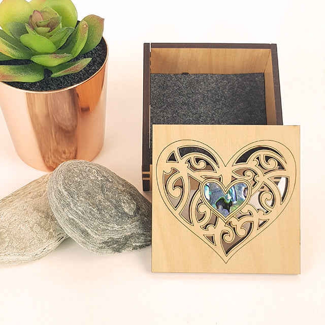 Small heart-shaped trinket box made of NZ veneer with paua inlay, perfect for jewelry and keepsakes.