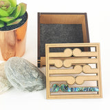 Elegant small square trinket box with paua inlay and Koru design, perfect for storing jewelry and keepsakes.