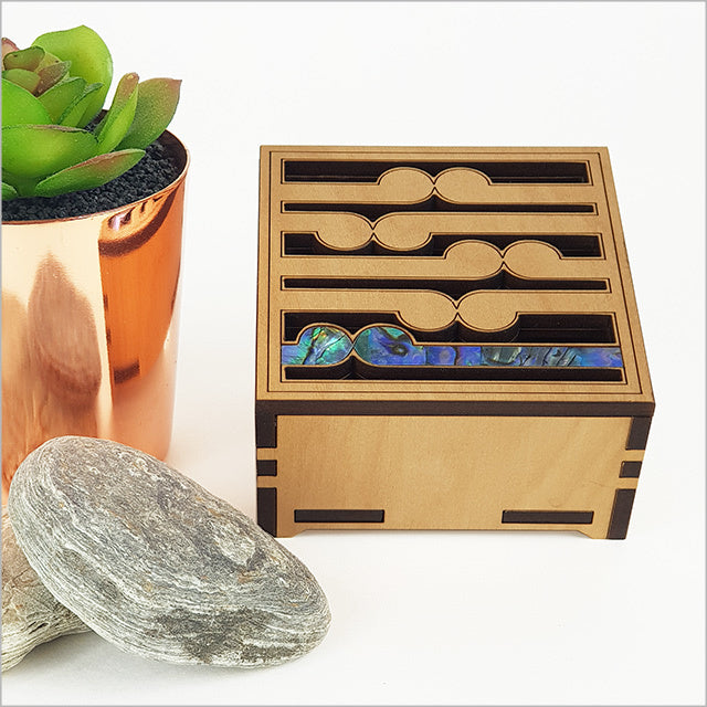 Elegant Square Trinket Box - Koru (Small) in NZ veneer with paua inlay, perfect for storing jewelry and keepsakes.