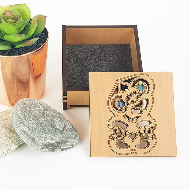 Square trinket box with paua inlays, 80mm x 80mm, showcasing Tiki culture and premium NZ veneer craftsmanship.