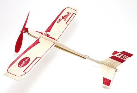 Balsa wood model kit of the Strato Streak glider, designed for beginners and enthusiasts, featuring rubber-powered flight performance.