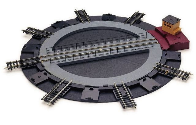 Hornby motorised turntable with motor for model railways, compatible with R965 controller, includes wiring and eight track sections.