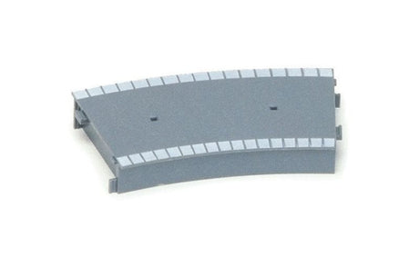 Hornby curved platform section for 1/76 model trains, seamlessly fitting first-radius tracks for realistic layouts.